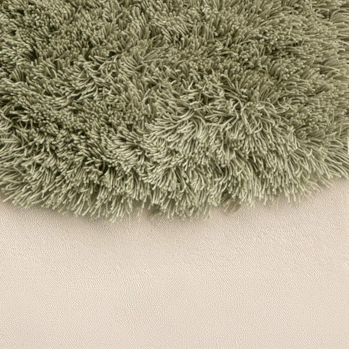Teppich Detailbild beige mit hellgrünen Details
